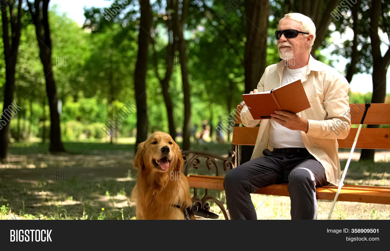 Blind man walking with cane